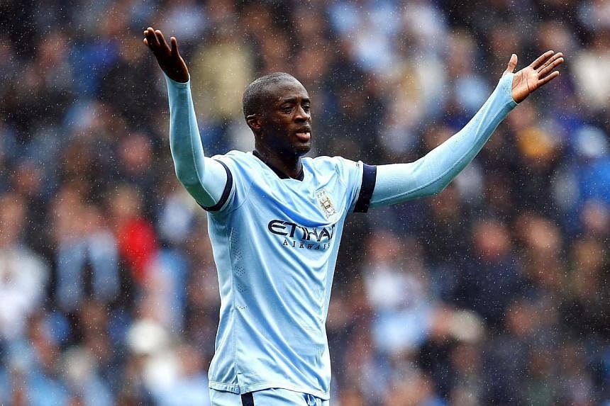 British police on Tuesday announced an investigation into complaints that Manchester City midfielder Yaya Toure was racially abused on Twitter. -- PHOTO: REUTERS