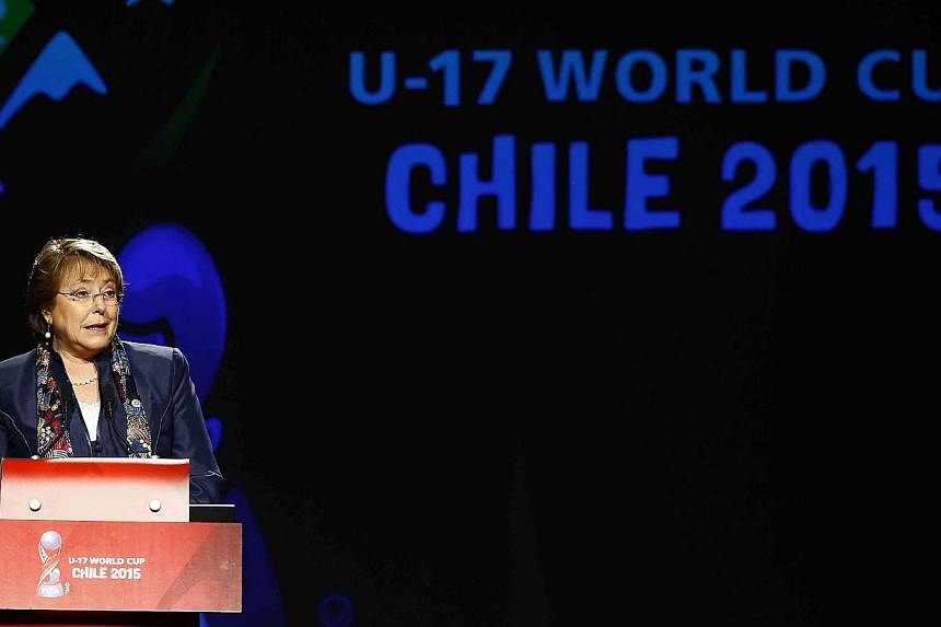 Chile's President Michelle Bachelet delivers a speech during the official launch of the 2015 Under-17 World Cup logo, in Santiago, on Oct 7, 2014. -- PHOTO: REUTERS