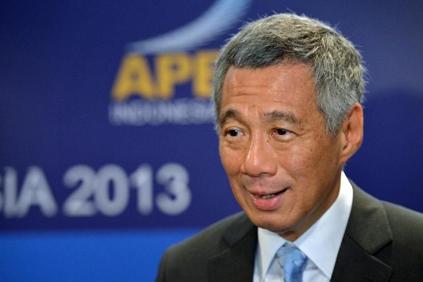 Singapore's Prime Minister Lee Hsien Loong speaking to reporters on the sidelines of the Asia-Pacific Economic Cooperation (APEC) Summit 2013 held at Sofitel Hotel in Nusa Dua in Bali, Indonesia on 8 Oct 2013.&nbsp;The APEC grouping has lived up to e