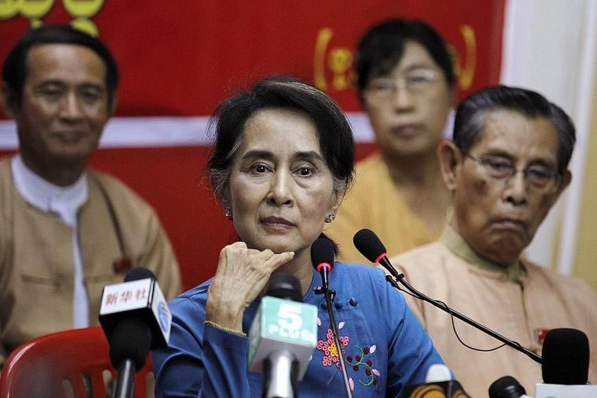 Myanmar's reform process is "stalling", opposition leader Aung San Suu Kyi said Wednesday, warning the United States against over-optimism before a visit by President Barack Obama to the former pariah state. -- PHOTO: REUTERS