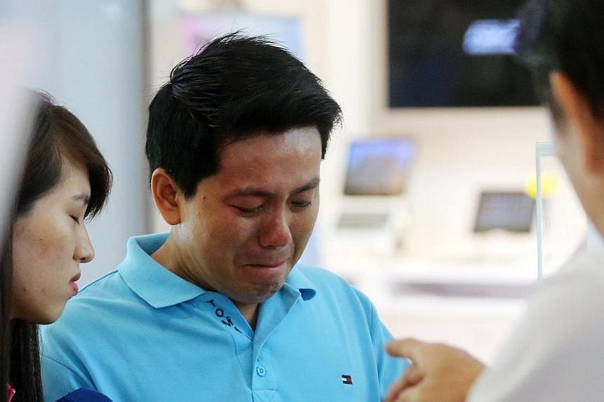 More than US$9,600 (S$12,450)&nbsp;has been raised to buy a new iPhone 6 for a Vietnamese tourist who was scammed in Sim Lim Square recently. -- PHOTO: ZAOBAO
