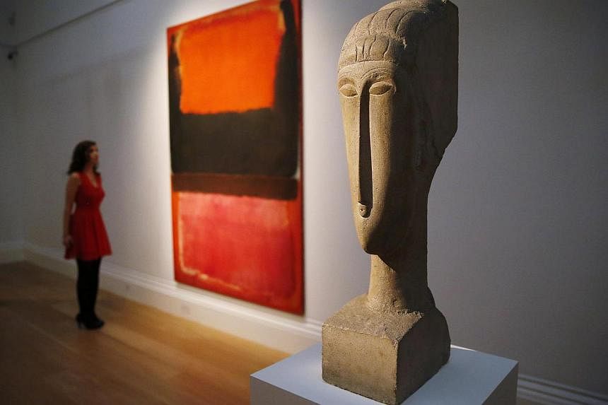 Stone sculpture 'Tete' by artist Amedeo Modigliani was sold for US$70.7 million. -- PHOTO: REUTERS