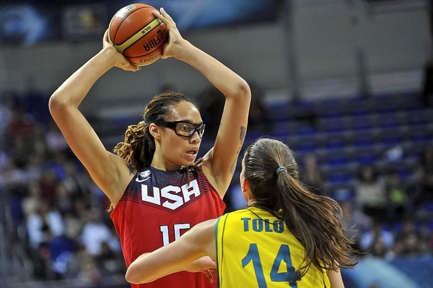 USA's Brittney Griner (left) challenges Australia's Marianna Tolo during the 2014 FIBA Women's World Championship semi-final basketball match between Australia and USA at the Fenerbahce Ulker Sports Arena in Istanbul on Oct 4, 2014.&nbsp;US women's b