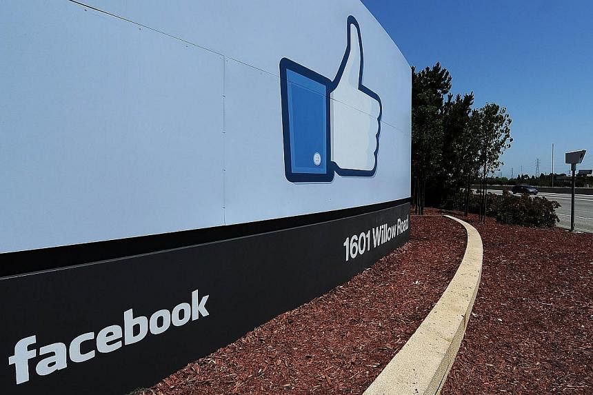A file photo showing the sign at the entrance to the Facebook main campus in Menlo Park, California.&nbsp;Facebook said on Tuesday that requests by governments for user information rose by about a quarter in the first half of 2014 over the second hal