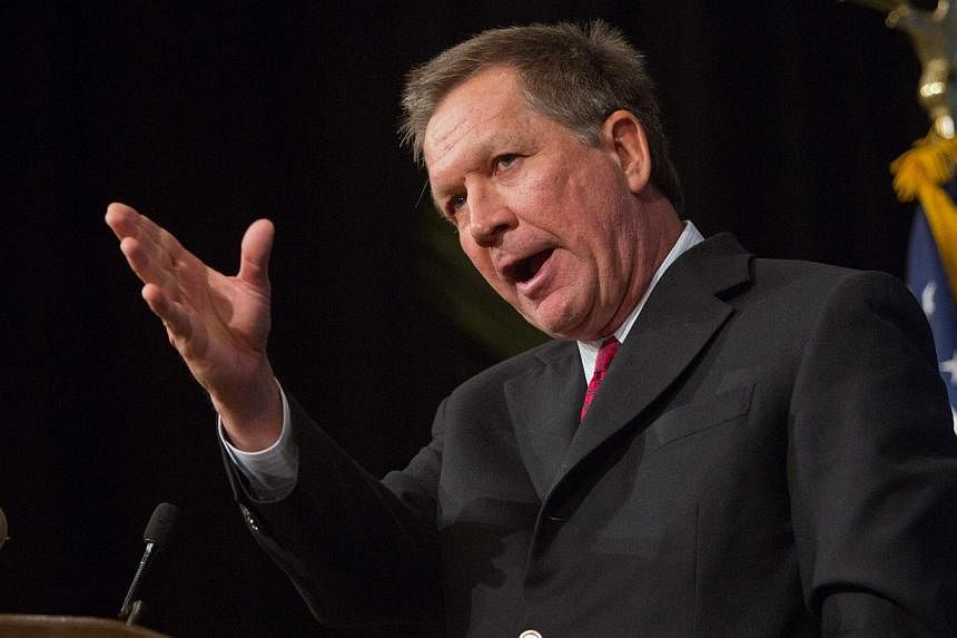 Ohio Republican Governor John Kasich has won re-election, CNN projected on Tuesday, beating Democratic challenger Ed FitzGerald in the electoral swing state. -- PHOTO: REUTERS