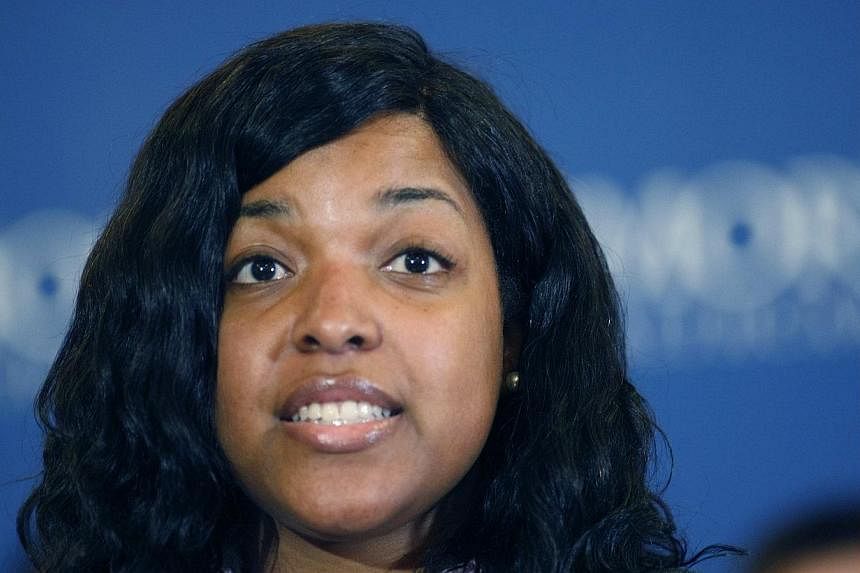 Amber Vinson speaks before her release from Emory University Hospital in Atlanta, Georgia on Oct 28, 2014.&nbsp;One of the US nurses who helped treat a Liberian man with Ebola in Texas last month defended her controversial decision to fly after treat