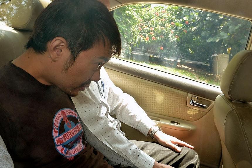 The former China tour guide embroiled in a tussle over the assets of a rich widow has been granted bail of $150,000, the court decided on Thursday. His passport has also been impounded. -- ST PHOTO:&nbsp;KUA CHEE SIONG