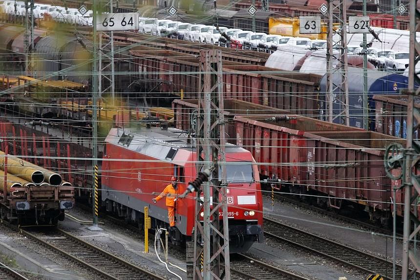 German train drivers extended their unprecedented strike action Thursday to passenger services in a thorny labour dispute, causing major travel disruption across the country. -- PHOTO: REUTERS