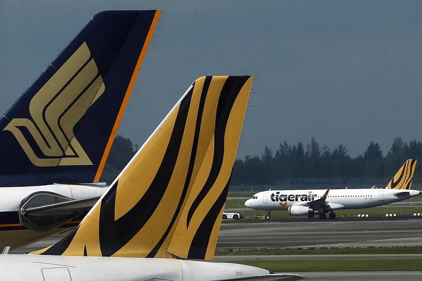 Singapore Airlines (SIA) is not currently considering a full takeover of partly-owned low-cost carrier Tiger Airways, even though it is raising its stake in the firm, the parent's chief executive Goh Choon Phong said on Friday. -- PHOTO: REUTERS