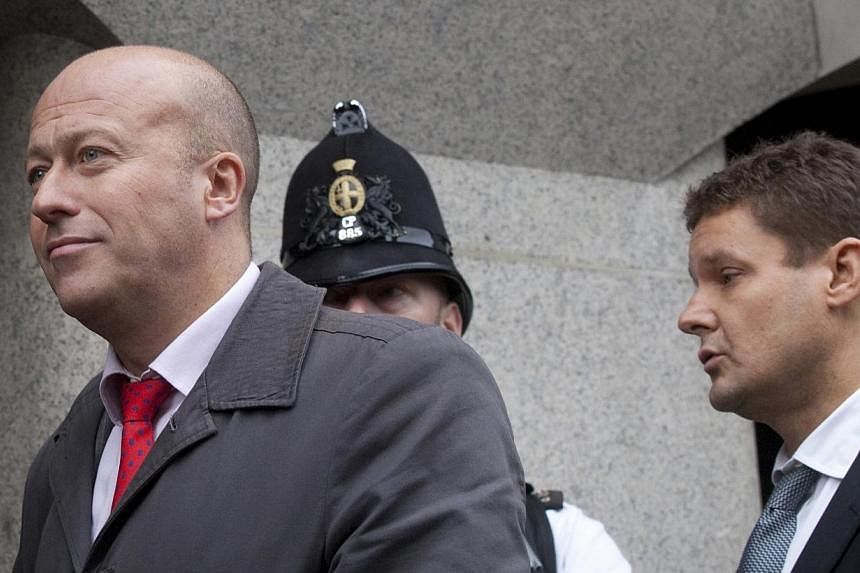 Former newspaper executive, Ian Edmondson (left) whose emails led to the exposure of widespread phone-hacking at Rupert Murdoch's now-defunct British tabloid, the News of the World, was jailed for eight months on Friday. -- PHOTO: BLOOMBERG