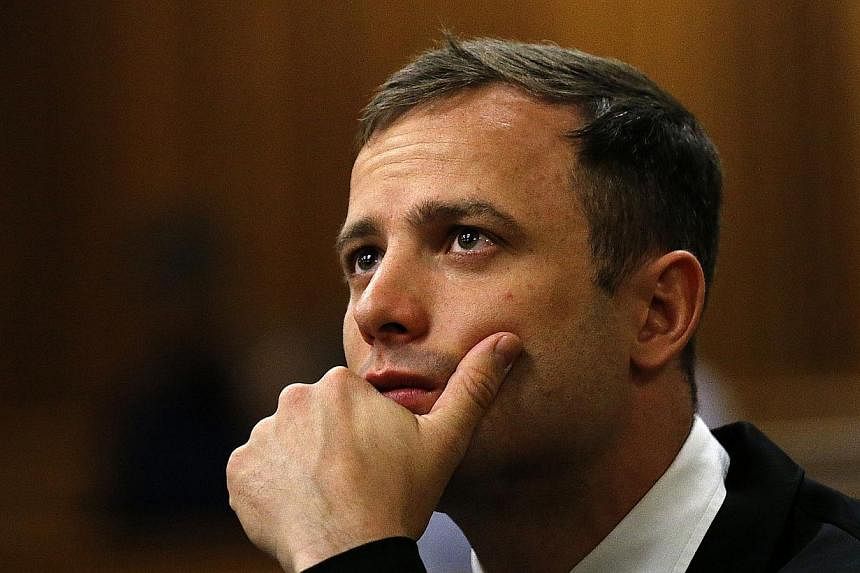 South African paralympic athlete Oscar Pistorius waiting before his sentencing hearing at the North Gauteng High Court in Pretoria on Oct 16, 2014.&nbsp;Oscar Pistorius' lawyers have formally opposed an appeal by the state against the South African a