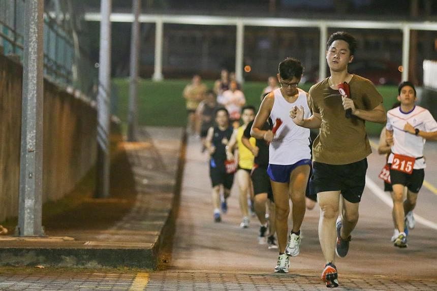 Operationally ready national servicemen running during their IPPT Preparatory Training programme in Maju Camp. The SAF has made bold moves to get rid of pain points in its physical fitness programme to help NSmen keep fit.
