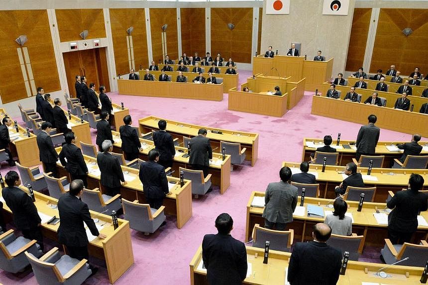 Kagoshima prefectural assembly members approving plans to restart nuclear reactors at the Kagoshima prefectural assembly in Kagoshima, Japan's southern island of Kyushu on Nov 7, 2014. A local assembly in Japan and the prefecture's governor on Nov 7 