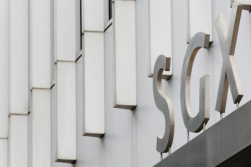 The Singapore Exchange (SGX) building.&nbsp;Singapore shares fell on Friday despite general optimism about improving employment in the United States, the world's biggest economy. -- PHOTO: BUSINESS TIMES FILE