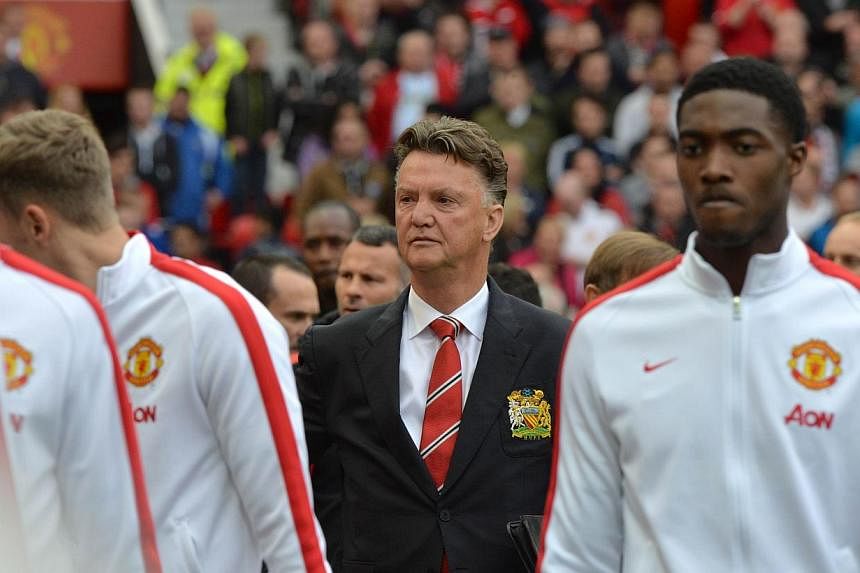 Manchester United's Dutch manager Louis van Gaal arrives for a match between United and Everton at Old Trafford on Oct 5, 2014. A dismal start to the season and a seemingly never-ending defensive injury crisis have left van Gaal feeling "lousy", he s