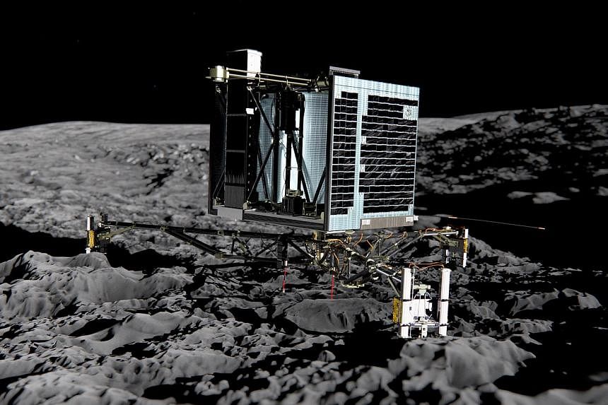 This photo released by the European Space Agency on Dec 20, 2013 shows an artist impression of Rosetta's lander Philae on the surface of comet 67P/Churyumov-Gerasimenko. -- PHOTO: AFP