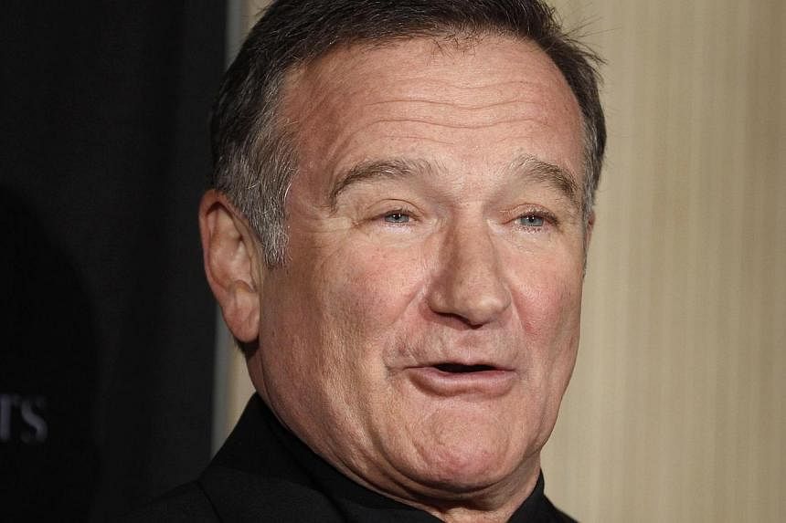 Hollywood star Robin Williams was suffering from increase in paranoia when he committed suicide by hanging himself, coroners said on Friday. -- PHOTO: REUTERS