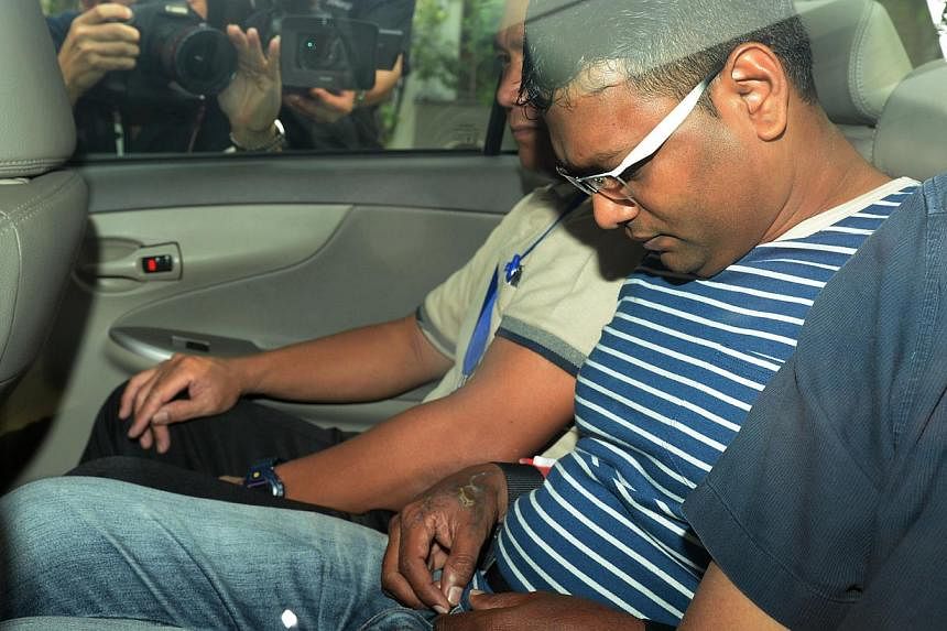Annadurai, 42, charged with voluntarily causing hurt in committing armed robbery. -- ST PHOTO: AZIZ HUSSIN