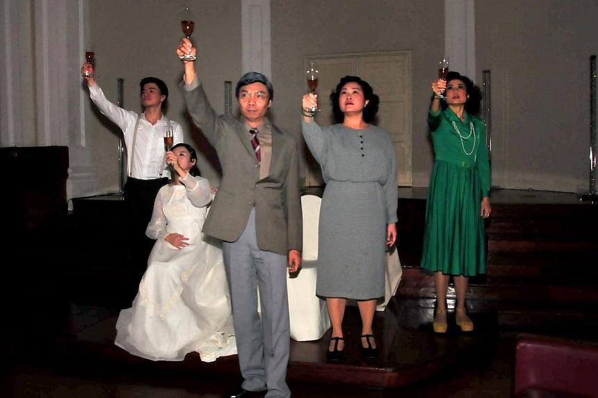 A scene from Body X, an experiential murder-mystery play commissioned for the Singapore Writers Festival. (From left to right) Ong Chin Hwee, Tan Wan Sze (in white gown), Tay Kong Hui, Judy Ngo (grey dress) and Doreen Toh (green dress). -- PHOTO: THE