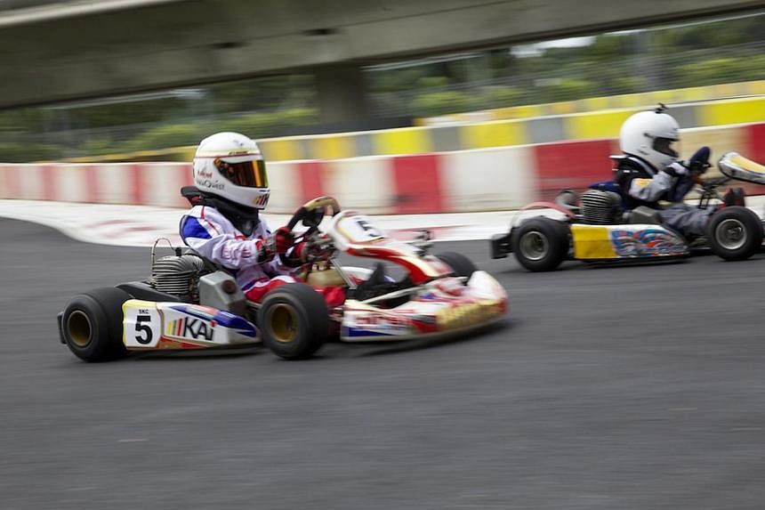 Cadet Karters aged below twelve taking their karts for a spin at the new KF1 Karting Circuit located at the Singapore Turf Club premises in Kranji. -- PHOTO: KF1 PTE LTD&nbsp;