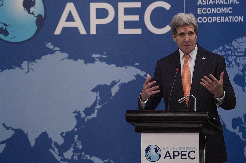 US Secretary of State John Kerry delivers a speech at the National Center for APEC annual luncheon at the Asia-Pacific Economic Cooperation (APEC) meeting in Beijing on Nov 8, 2014. -- PHOTO: AFP