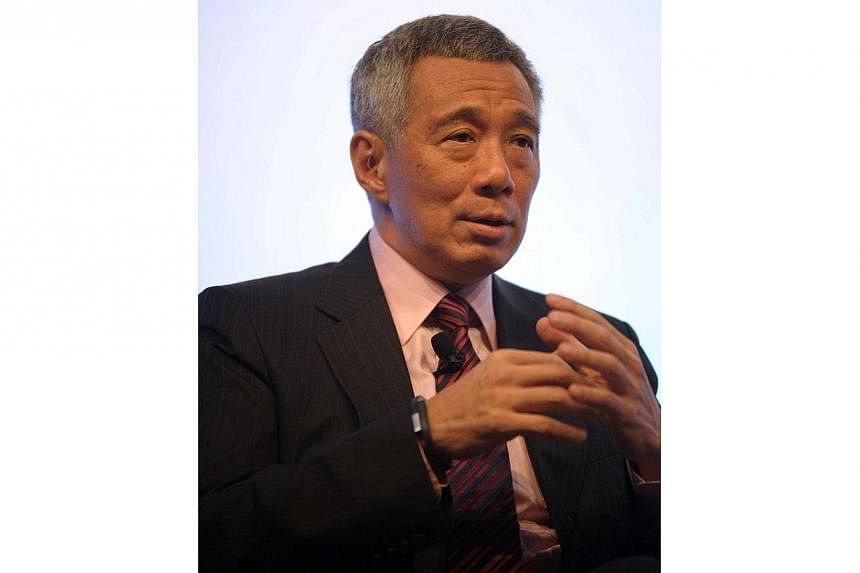 Prime Minister Lee Hsien Loong will attend two back-to-back summits in China and Myanmar, over a five-day trip that starts on Sunday. -- PHOTO: AFP