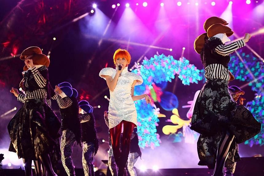 Stefanie Sun performing at the National Stadium on July 5, 2014.&nbsp;The Singapore Hit Awards on Nov 7 evening capped a triumphant comeback by home-grown pop star Sun.&nbsp;Kepler was her first album since she became a wife and mother, and she swept