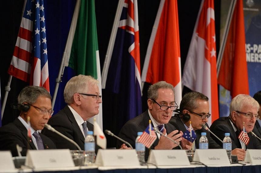 US Trade Representative Mike Froman (centre) speaks at a press conference for the Trans-Pacific Partnership (TPP) in Sydney on Oct 27, 2014.&nbsp;There will be no "major announcement" on a Washington-backed Asia Pacific free trade deal during a meeti