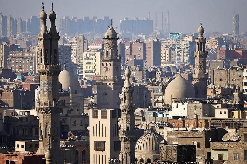 The minaret's of mosques are pictured in Cairo on Nov 8, 2014. Egypt on Saturday announced the arrest of a US-Egyptian citizen accused of having posted on Islamic militant websites a threat to attack American and other international schools in the re