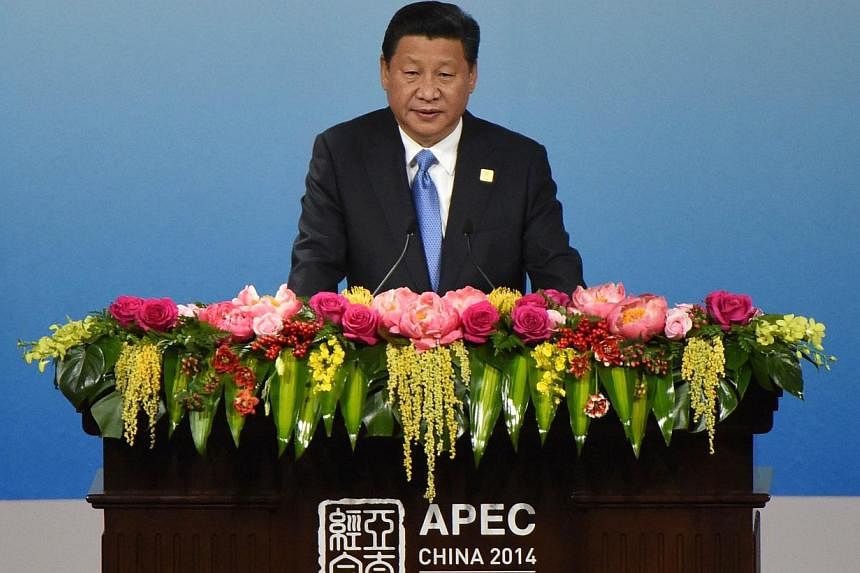 China's President Xi Jinping speaking to open the Apec CEO Summit at the China National Convention Centre (CNCC) in Beijing on Nov 9, 2014, part of the Asia-Pacific Economic Cooperation (Apec) Summit. Top leaders and ministers of the 21-member Apec g