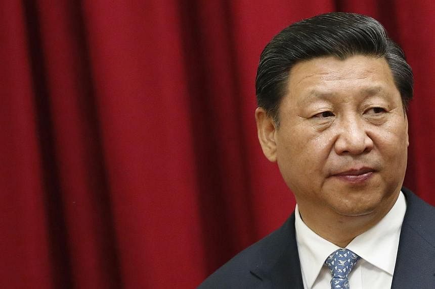 China's economy is stable and the risks that it faces are not that scary, President Xi Jinping said on Sunday in a speech at the Asia-Pacific Economic Cooperation (Apec) CEO Summit. -- PHOTO: REUTERS