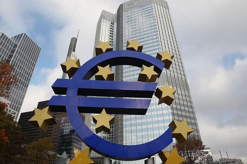 The Euro Zone logo located in front of the European Central Bank in Frankfurt, Germany. -- PHOTO: AFP&nbsp;