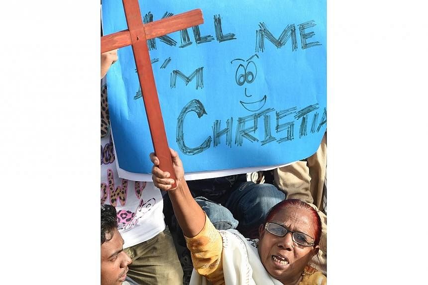 Minority Pakistani Christians protest against the Nov 4 murder of a Christian couple in Lahore on Nov 9, 2014. -- PHOTO: AFP