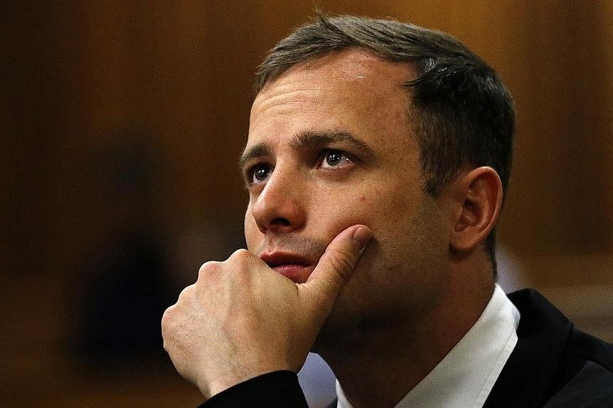 Paralympian Oscar Pistorius was found guilty of manslaughter and sentenced to five years in prison for the death of his girlfriend Reeva Steenkamp. -- PHOTO: AFP