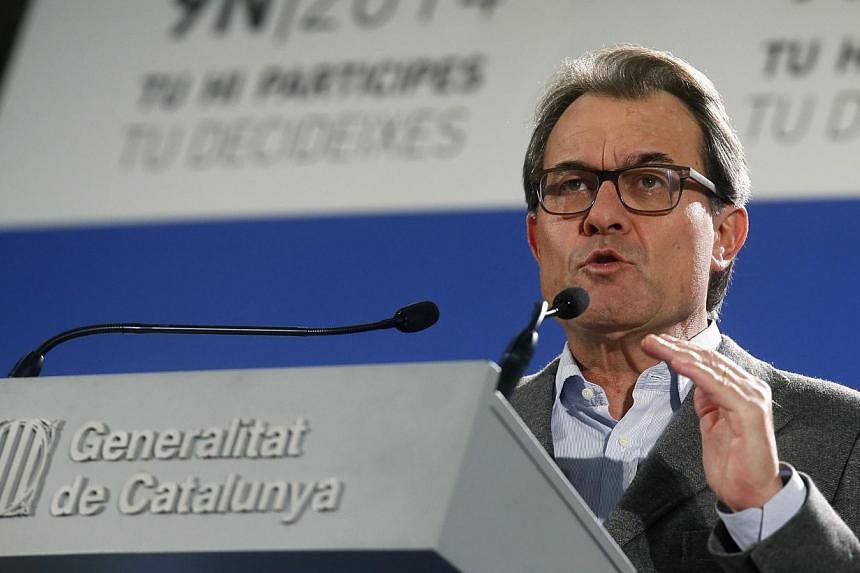 Catalan President Artur Mas speaks during a news conference assessing the results after Catalans voted in a symbolic independence vote in Barcelona, on Nov 9, 2014. -- PHOTO: REUTERS