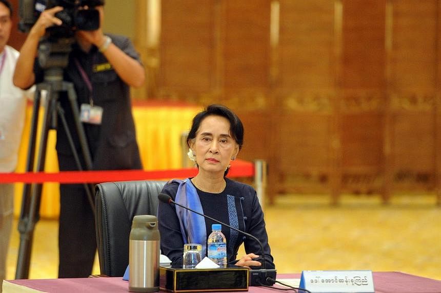 Aung San Suu Kyi, chairman of National League for Democracy (NLD) and lower house member of Parliament at a meeting with Myanmar President Thein Sein (not pictured) last month as he opened unprecedented talks with army top brass and political rivals 