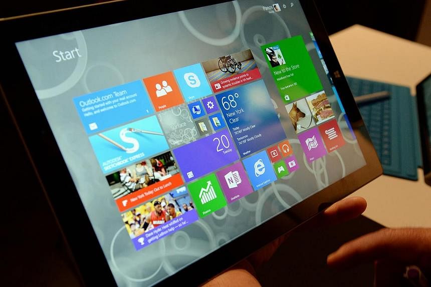 Students from the Institute of Technical Education (ITE) may each get a Microsoft Surface touch-screen device to help them learn in and out of classrooms. -- PHOTO: AFP