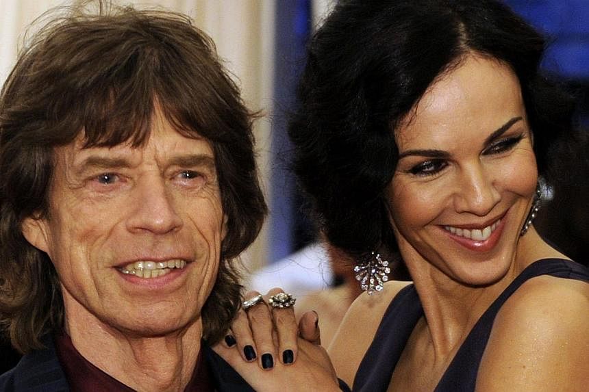 In this May 7, 2012 file photo, musician Mick Jagger and L'Wren Scott attend the Costume Institute Benefit at The Metropolitan Museum of Art in New York. -- PHOTO: AFP