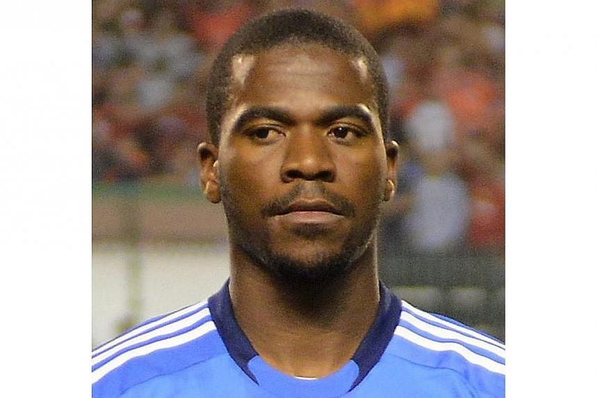 A file photo taken on Nov 10, 2013 shows Orlando Pirates goalkeeper Senzo Meyiwa posing for a team picture ahead of the African Champions League second leg final between South Africa's Orlando Pirates and Egypt's Al-Ahly in Cairo.&nbsp;South African 