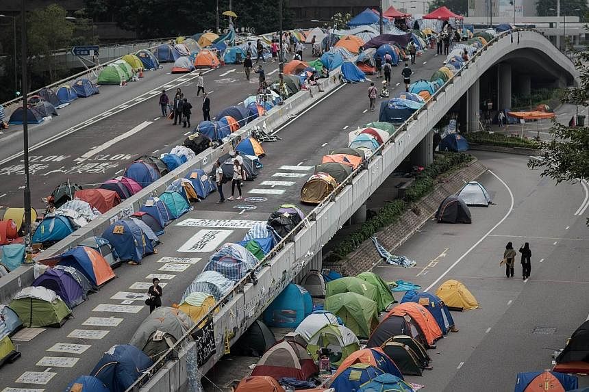 A pro-democracy protest site set up on a highway in the Admiralty district of Hong Kong on Nov 11, 2014. The weeks-long mass democracy protests had influenced the survey, said the head of the Chinese University of Hong Kong's journalism school, which