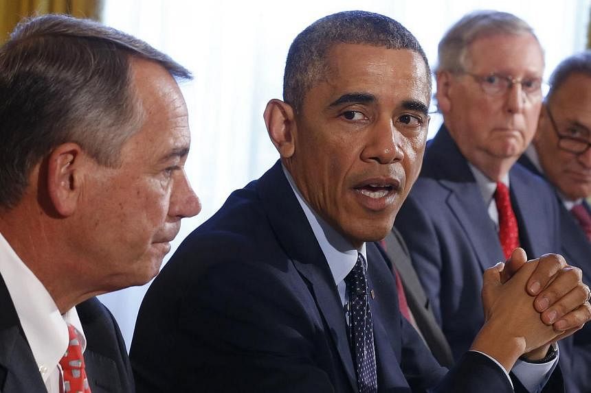 (From left) Speaker of the House John Boehner, US President Barack Obama, Senate Minority Leader Mitch McConnell - who is set to become Majority Leader - and Democratic Senator Chuck Schumer at a luncheon for Congressional leaders in the Old Family D