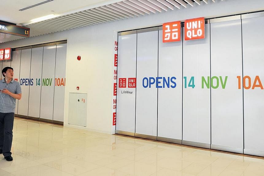 A Uniqlo outlet that is set to open at One KM Mall in Tanjong Katong. One KM is one of three new malls slated to open by Christmas, and like some malls today, it counts Uniqlo among its anchor tenants.