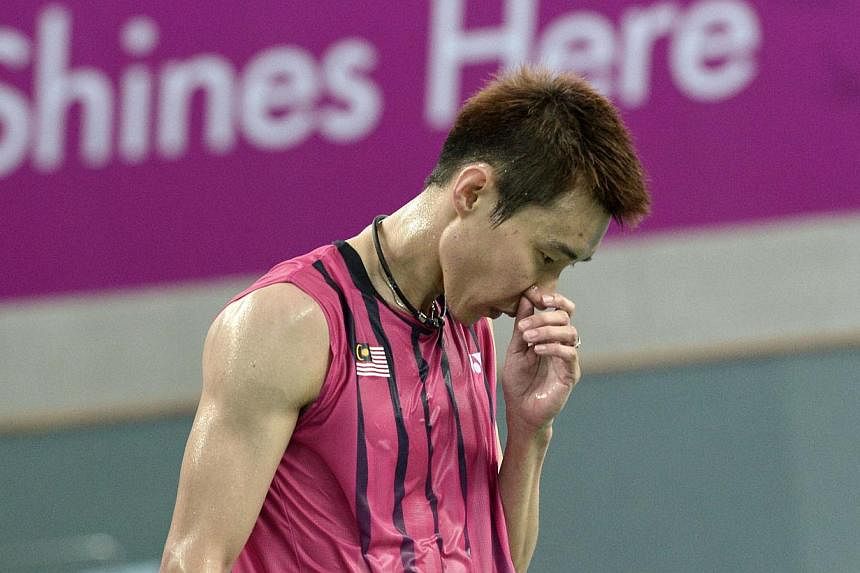 Malaysia's world No. 1 Lee Chong Wei has been provisionally suspended for an "apparent" anti-doping violation, the Badminton World Federation (BWF) said on Tuesday. -- PHOTO: AFP