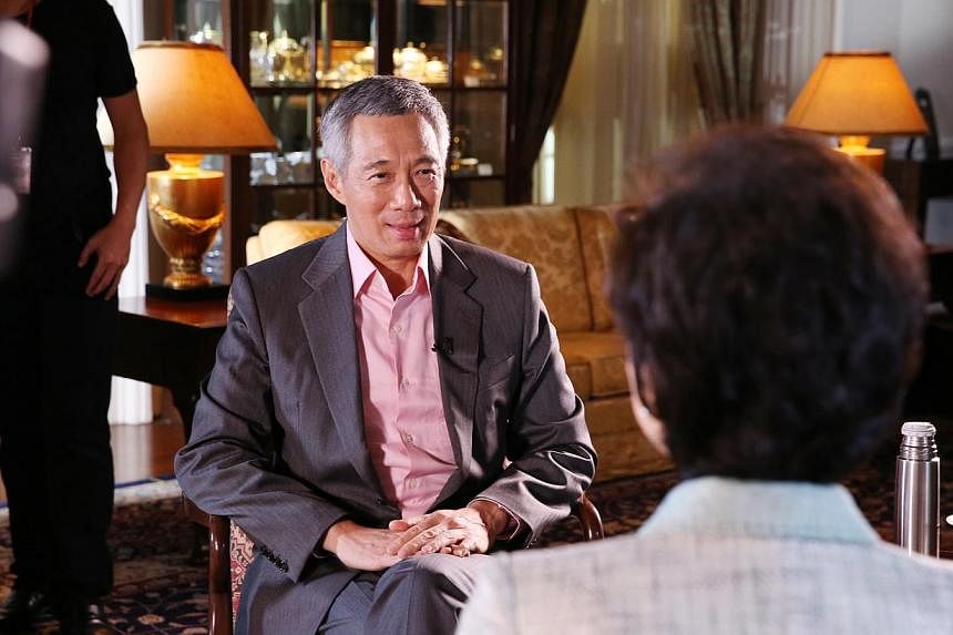 Prime Minister Lee Hsien Loong was interviewed by prolific Chinese media television host Yang Lan last week, ahead of the Asia-Pacific Economic Cooperation (Apec) summit in Beijing over the weekend. -- PHOTO: MINISTRY OF INFORMATION AND COMMUNICATION