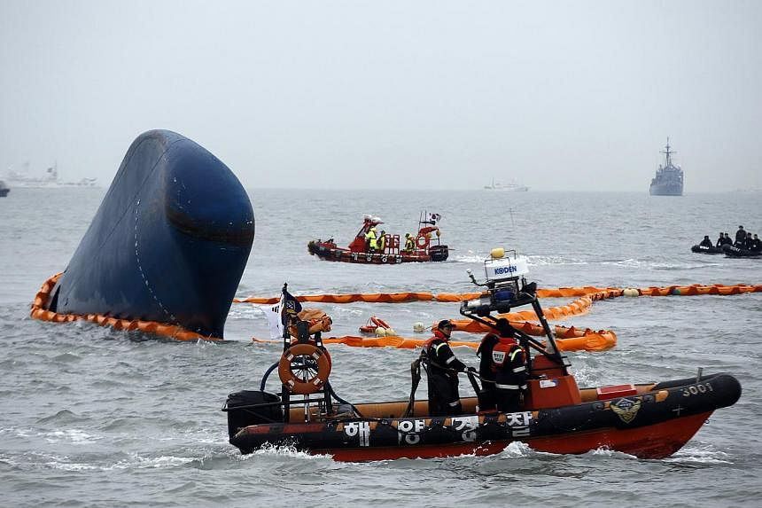 Rescue boats sail around the sunken South Korean passenger ship Sewol, in the sea off Jindo, on April 17, 2014. -- PHOTO: REUTERS&nbsp;