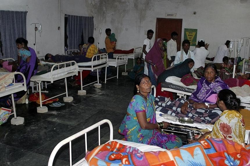 Women who underwent botched sterilisation surgeries at a government mass sterilisation "camp" receive treatment at a district hospital in Bilaspur, in the Indian state of Chhattisgarh, on Nov 10, 2014. The 13 women who died, among more than 80 to und