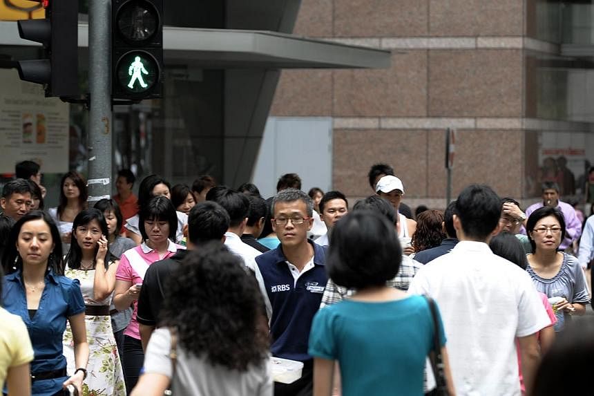The survey found that Singapore workers agreed most with the statement "I am confident in doing my job" and least with the statement "I like how things work in my company". -- PHOTO: ST FILE