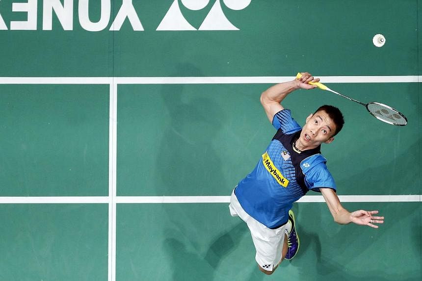 Malaysia's Lee Chong Wei hits a return during his men's singles final match against Indonesia's Tommy Sugiarto at the Malaysian Open Super Series 2014 badminton tournament in Kuala Lumpur on Jan 19, 2014. -- PHOTO: REUTERS