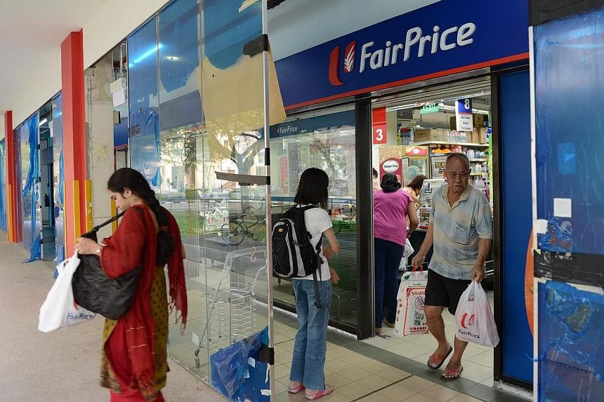 Shoppers at NTUC Fairprice in Rivervale Plaza. -- ST PHOTO: JOYCE FANG &nbsp;