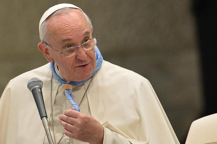 Pope Francis has called on Group of 20 leaders not to forget the poor, saying to do so would be "regrettable" as the heads of the world's most powerful economies prepare to meet in Australia. -- PHOTO: AFP